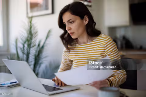 Woman working at a computer